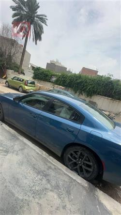 دۆج چارجەر